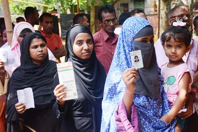 Muslim voters cast their votes in Sonamura area on April 19