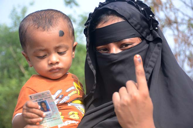 Muslim voters cast their votes in Sonamura area on April 19 